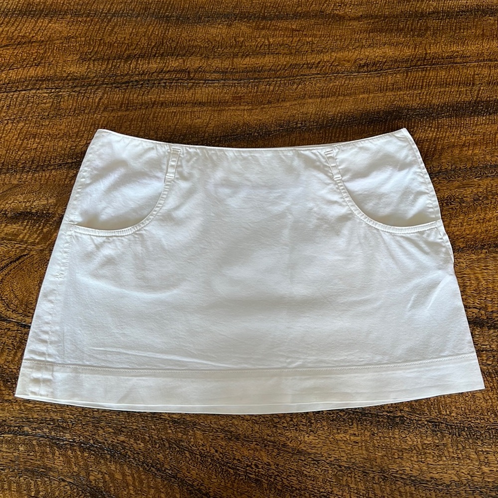 Prada white mini skirt.  Size 42.  White with no rips stains or tears.